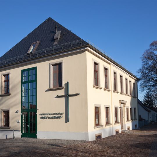 Wohnhaus in offener Bebauung, heute Kath. Gemeindehaus Am Schloß 1