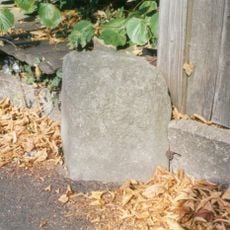 Milestone, Basingstoke Road; opp. No.52, & Bourne Avenue, on boundary of Telecom Building