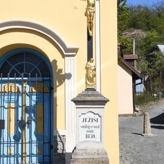 Wayside cross in front of the chapel of the Transfiguration