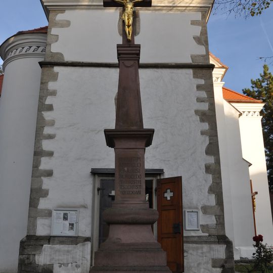 Wayside cross in front of church of Saint Giles