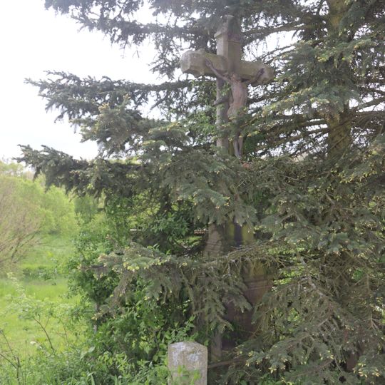 Kříž východně od Dančovic v místě zvaném Šimkův mlýn z roku 1900