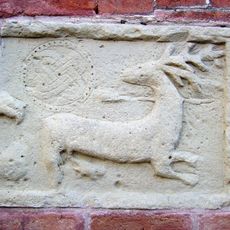 Replica del rilievo posto nella controfacciata della chiesa.