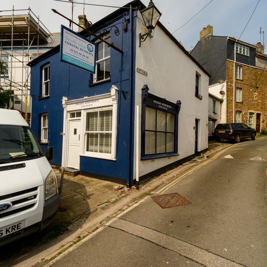 Premises Occupied By Village Gossip