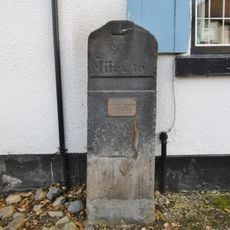 Milestone, Currier Lane; by No. 69-71