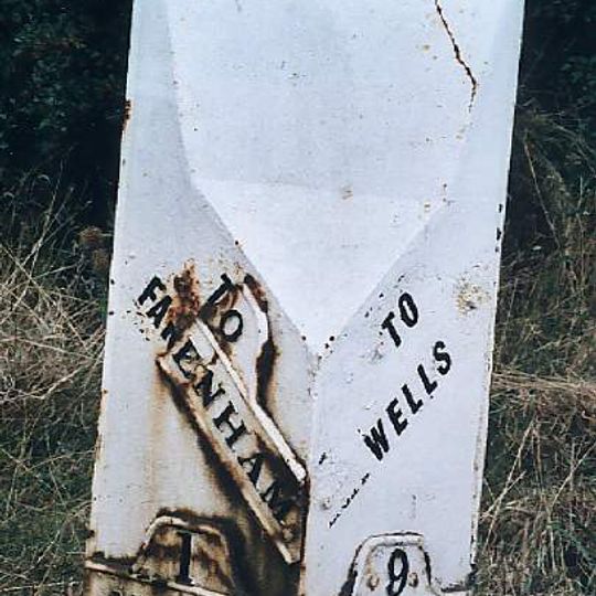 Milepost, 30yds N of jct with A148