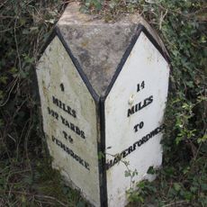 Milepost opposite turning to Pisgah