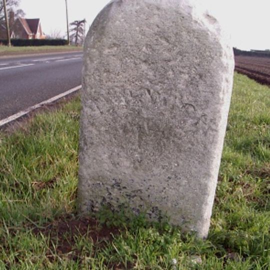 Milestone, 50yds E of Woodrising Rd