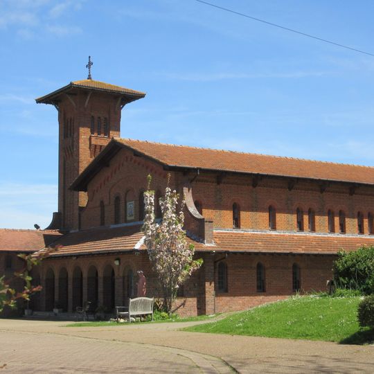 Roman Catholic Church of Saviour, and the brick entrance walls