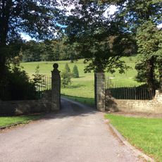 Gate piers, gates and railings at main entrance to Llanharan House