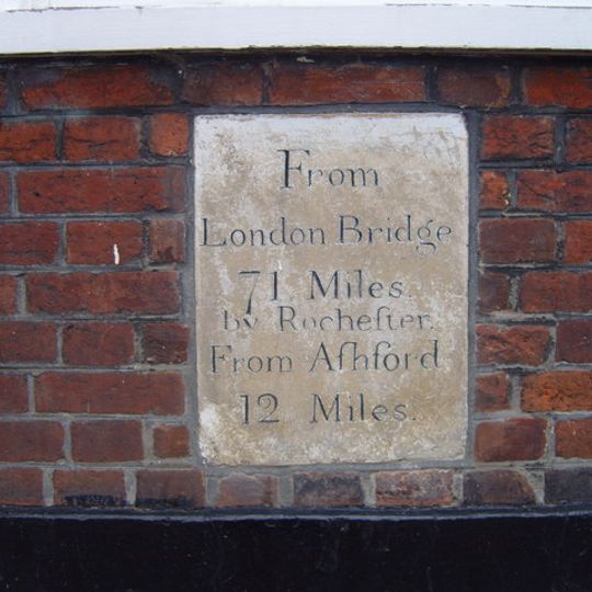 Milestone, High Street, in wall of the Swan Hotel