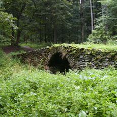 Gold mine with safes and a bridge over Gold streem