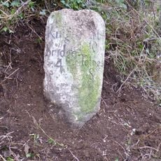 Milestone, N of Higher Fallapits Farm, half mile NE of The Mounts village