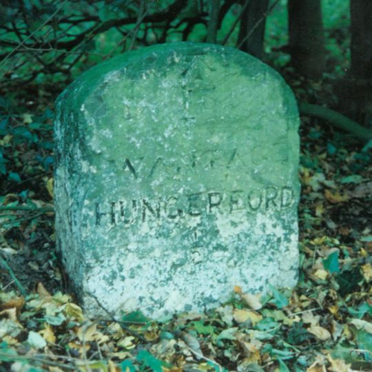 Milestone 100 Metres South Of Entrance To Folly Farm