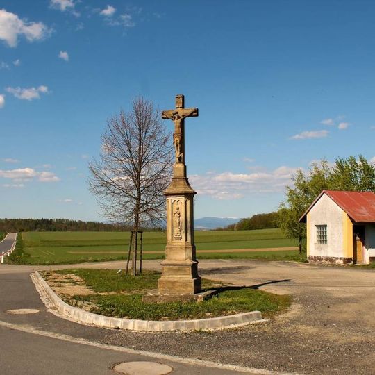 Kříž v Měrotíně u autobusové zastávky