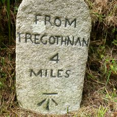 Milestone Circa 50M West Of West Trelowthas Bungalow