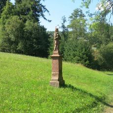 Socha svatého Jana Nepomuckého u cesty k vodojemu v Želechách