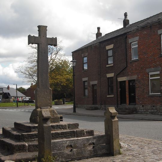 Village cross and stocks