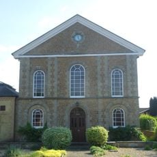 United Reformed Church and Attached Graveyard Wall with Gatepiers and Railings