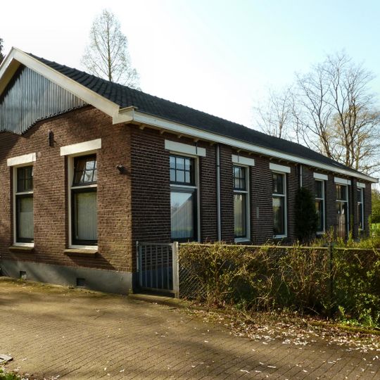 Dienstwoning met werkplaats