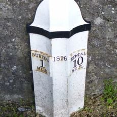 Milepost, S of B6384 jcn, just N of football pitch
