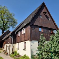 Wohnstallhaus (ehemals Umgebinde) mit Oberlaube und angebauter Scheune Am Mühlendamm 13