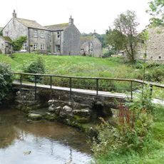 Clapper bridge approximately 20 metres east of Fountaines Hospital