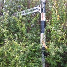 Guide Post In Front Of No 19