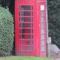 K6 telephone kiosk east of Monks Lane and the parish church