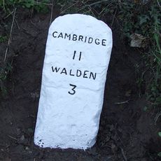 Milestone, Walden Road, 100 yards S of High Street.