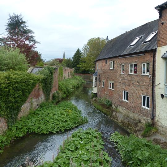 Lloyds Bank wall to north and south of garden