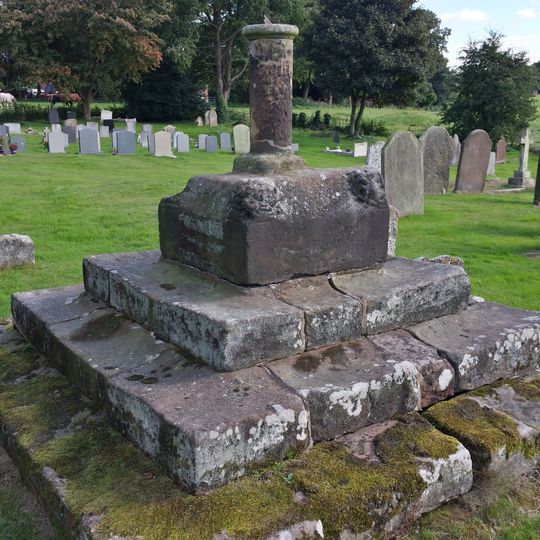 Churchyard cross base and sundial approximately 5 metres to south of South Chapel of Church of St Bartholomew