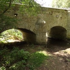 Stone bridge over the Výmola