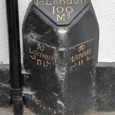 Milestone Attached To Front Wall Of The Red Lion Hotel (Not Included)