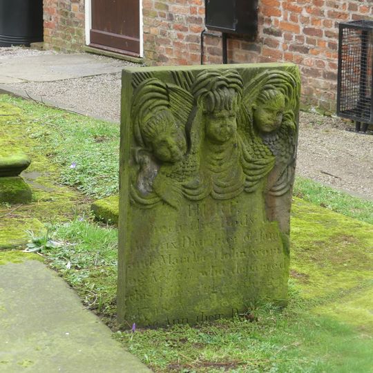 Tombstone of Beatrix Hollinsworth 12 metres west door of Church of St Andrew