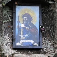 Obrázek svatého Jakuba na skále u cesty východně od Srbské Kamenice