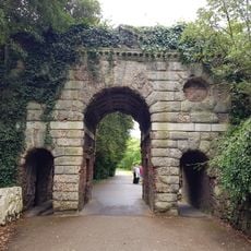 Ruined arch, including fragments of masonry at the base of the arch