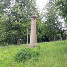 Rozcestník v Rakovníku u cesty z Lišan