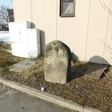 Křížový kámen na náměstí v Tuchlovicích