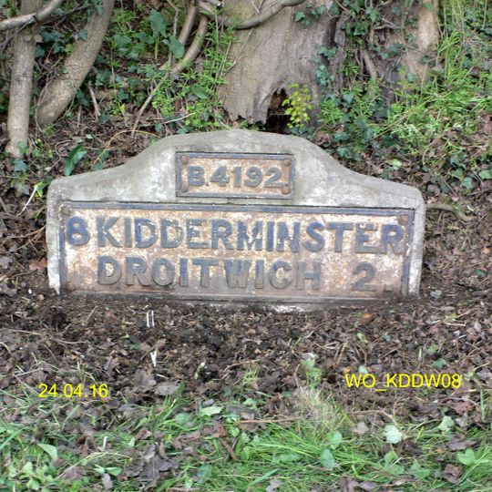 Milestone, N of Frenth Cottages, 30yds S of turning to Hampton Farm;
