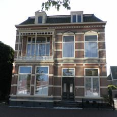 Woonhuis in overgangsstijl