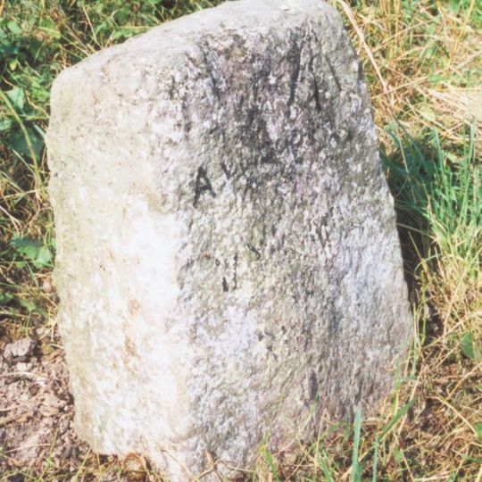 Milestone, Aylesbury Road; by lane to Old Grange, N of Askett
