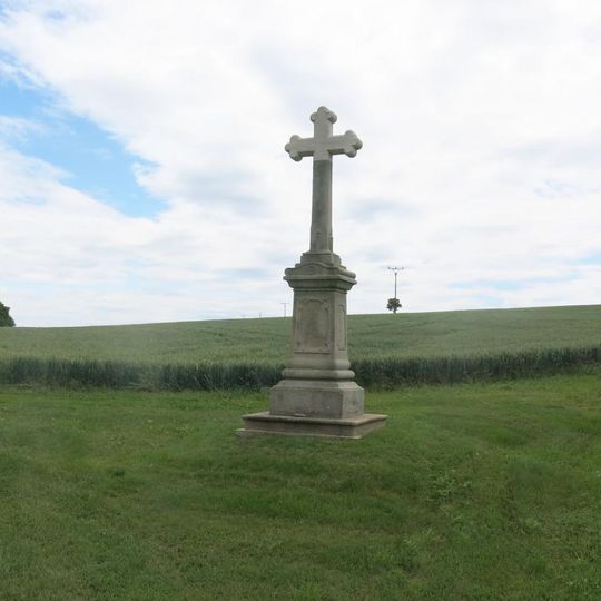 Kamenný kříž na jižním okraji Podlesic