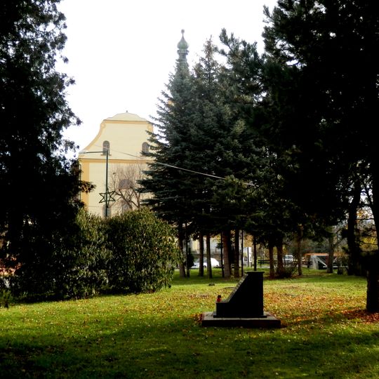 Defunct church with grounds, adjacent cemetery