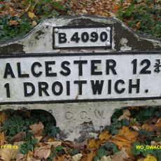 Milestone, Hanbury Road, E of M5 flyover, W of Hanbury Wharf