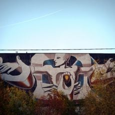 Мозаичное панно на фасаде библиотечного корпуса 2-го Медицинского института (2-го МОЛГМИ) «Исцеление человека» (Обручевский)