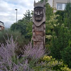 Dřevěná socha Hostana